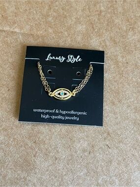 "EVIL EYE" BRACELET, 18K GOLD PLATED STEEL